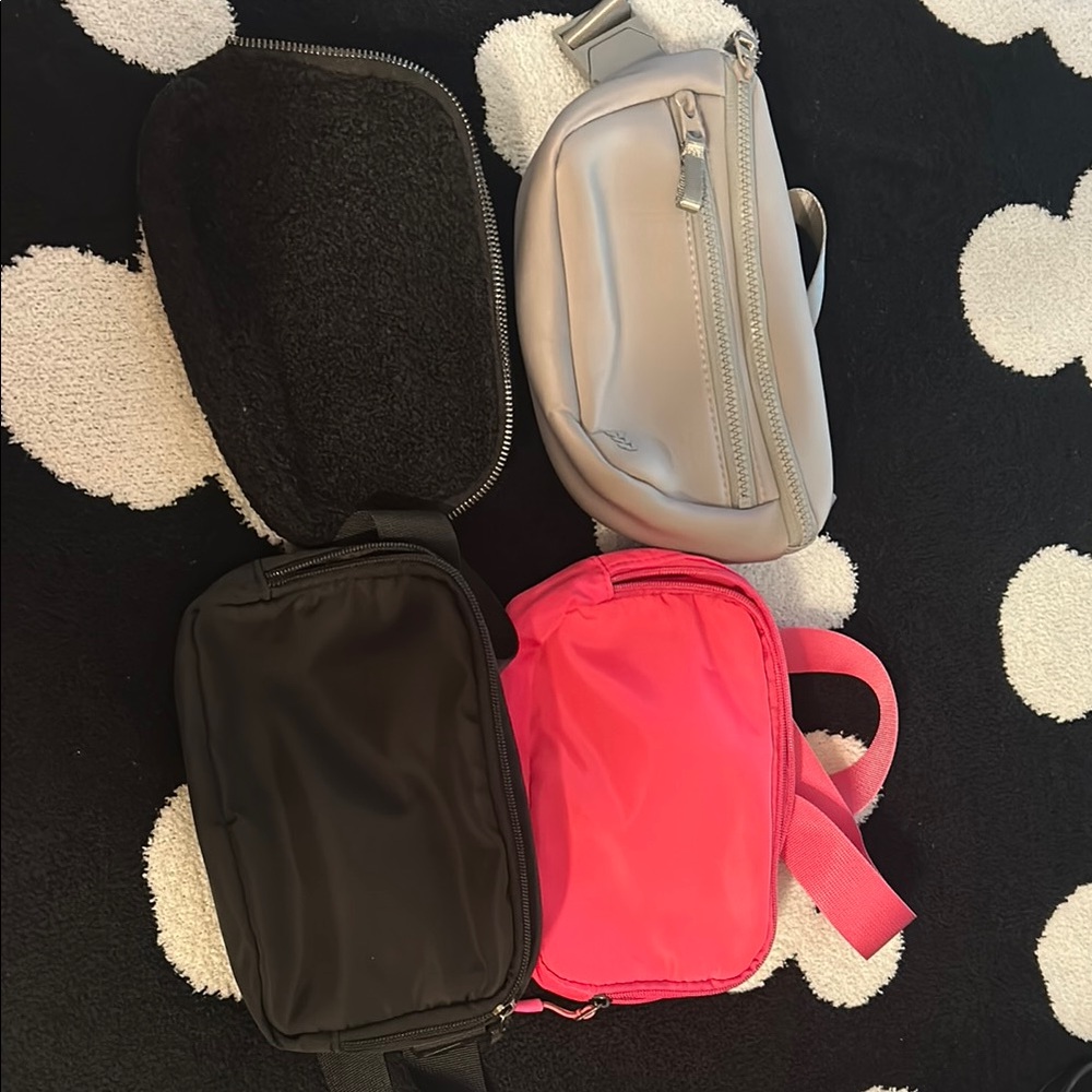 Set of Four Stylish Bags in Black, Pink, and Gray